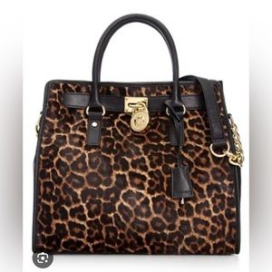 Michael Kors leapord purse! Like New only used a few times. Super classy!